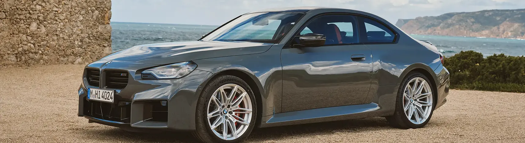 2025-BMW-M2-Coupé-Front-Shot-Portugal-Wallpaper-HD