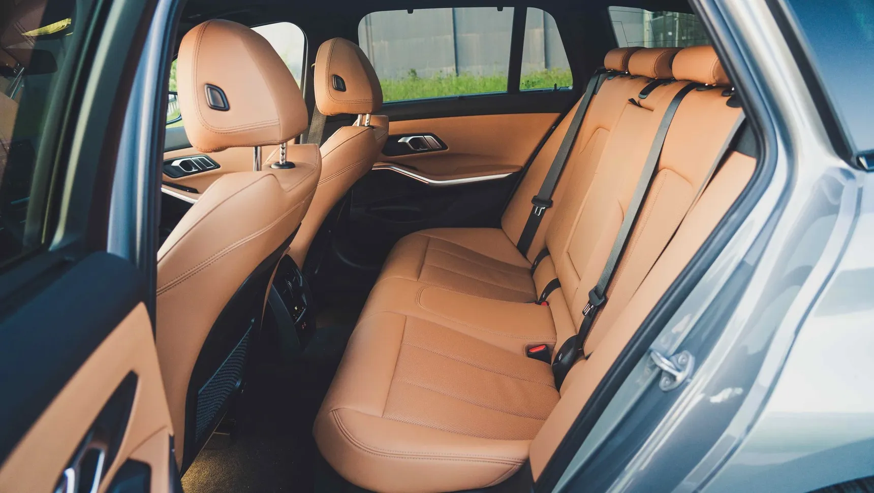 2024 BMW 320e Touring rear seats brown leather