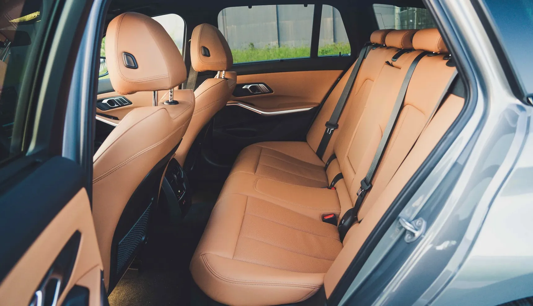 2024 BMW 320e Touring rear seats brown leather