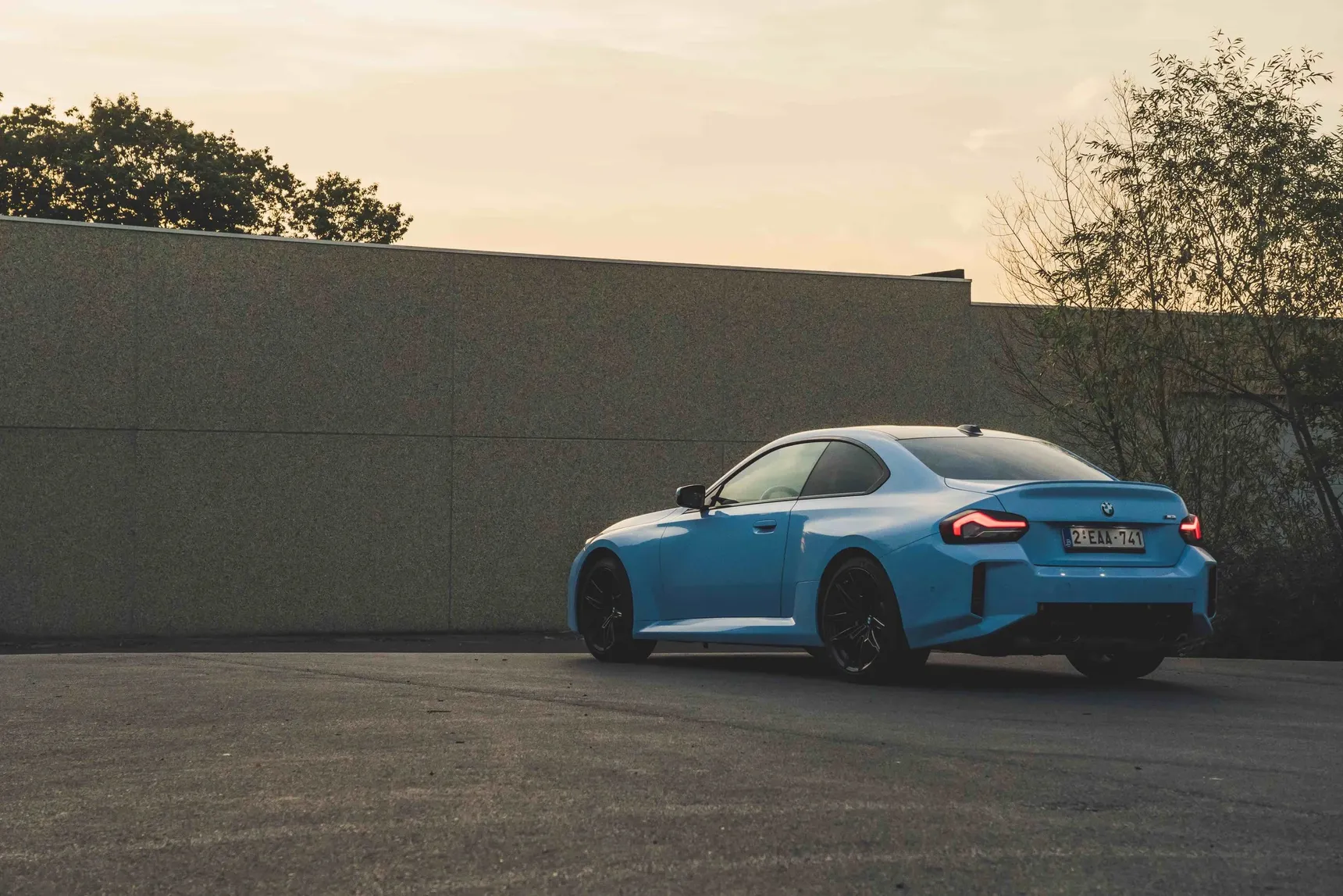 2024 BMW M2 manual rear 3/4 sunset hips