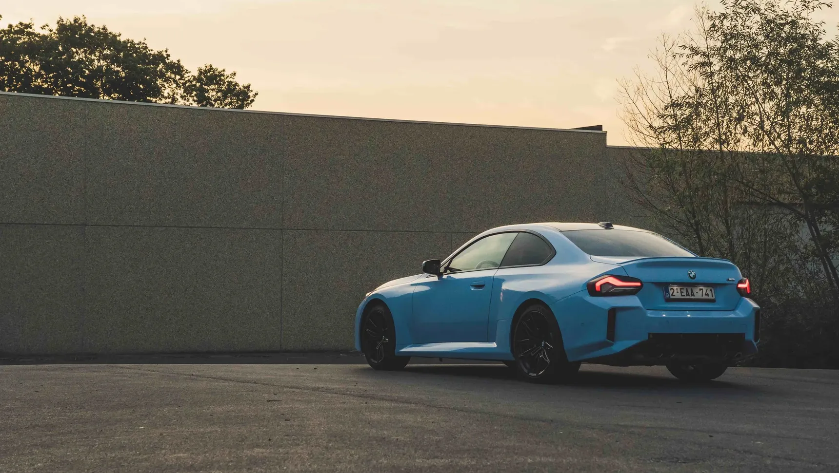 2024 BMW M2 manual rear 3/4 sunset hips