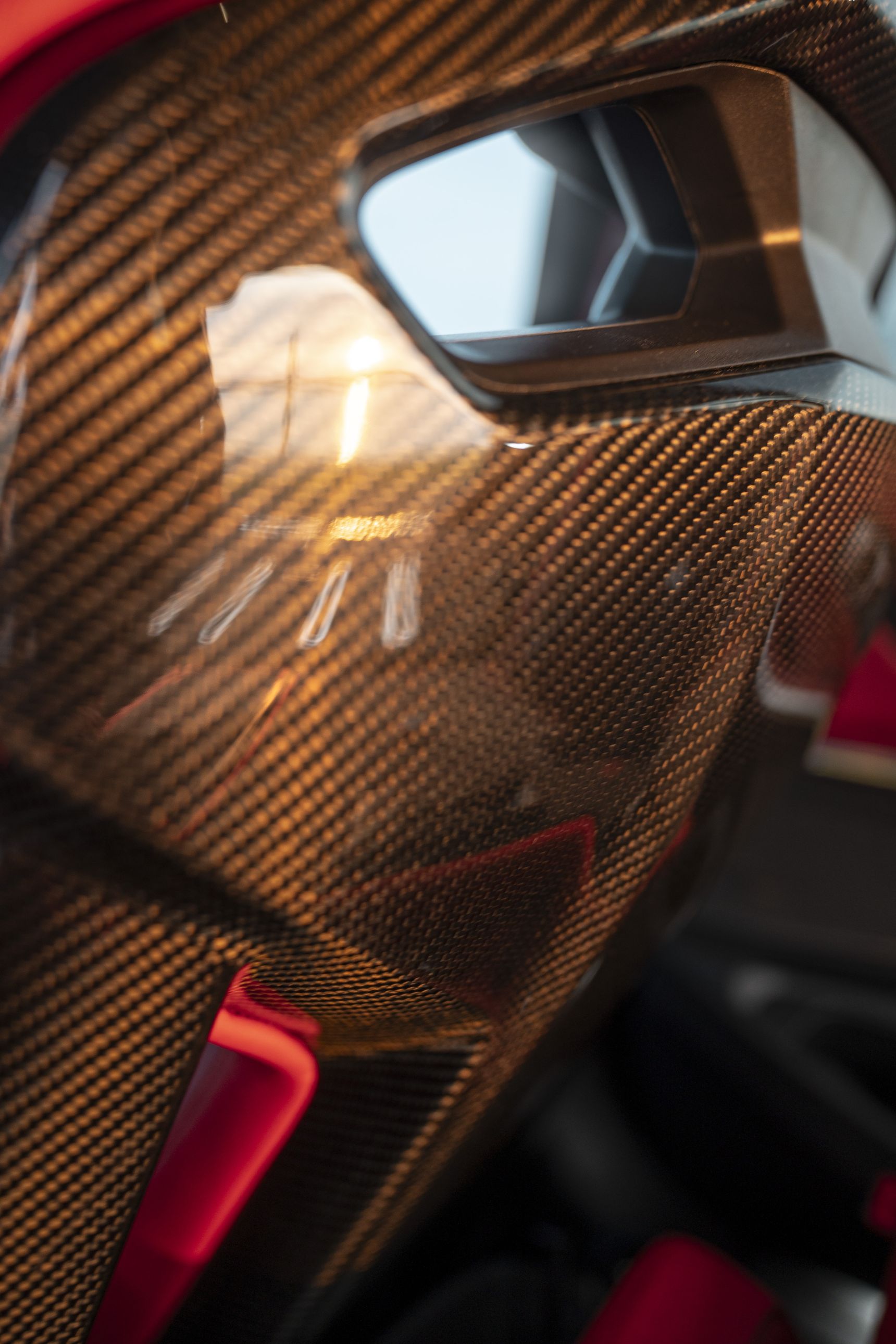 2023 BMW M3 Touring red carbon seats sunset iphone background