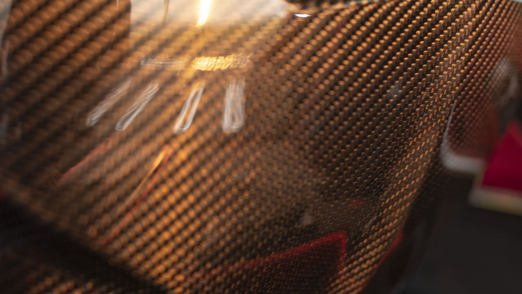 2023 BMW M3 Touring red carbon seats sunset iphone background