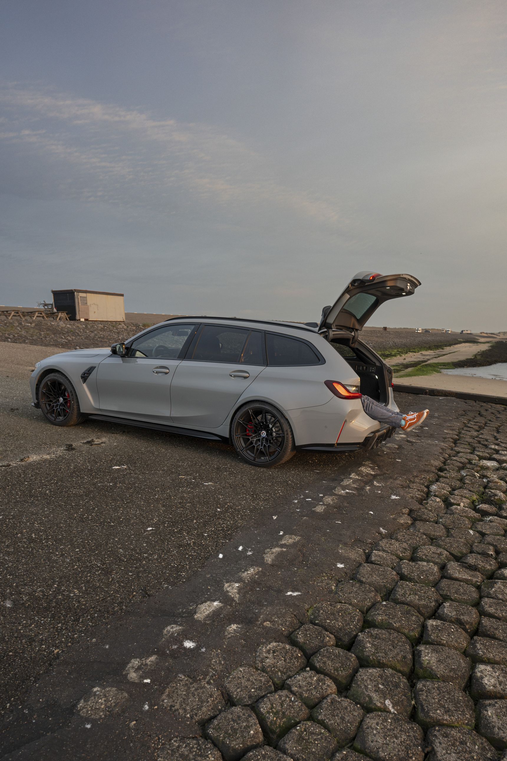 2023 BMW M3 Touring iphone background trunk side
