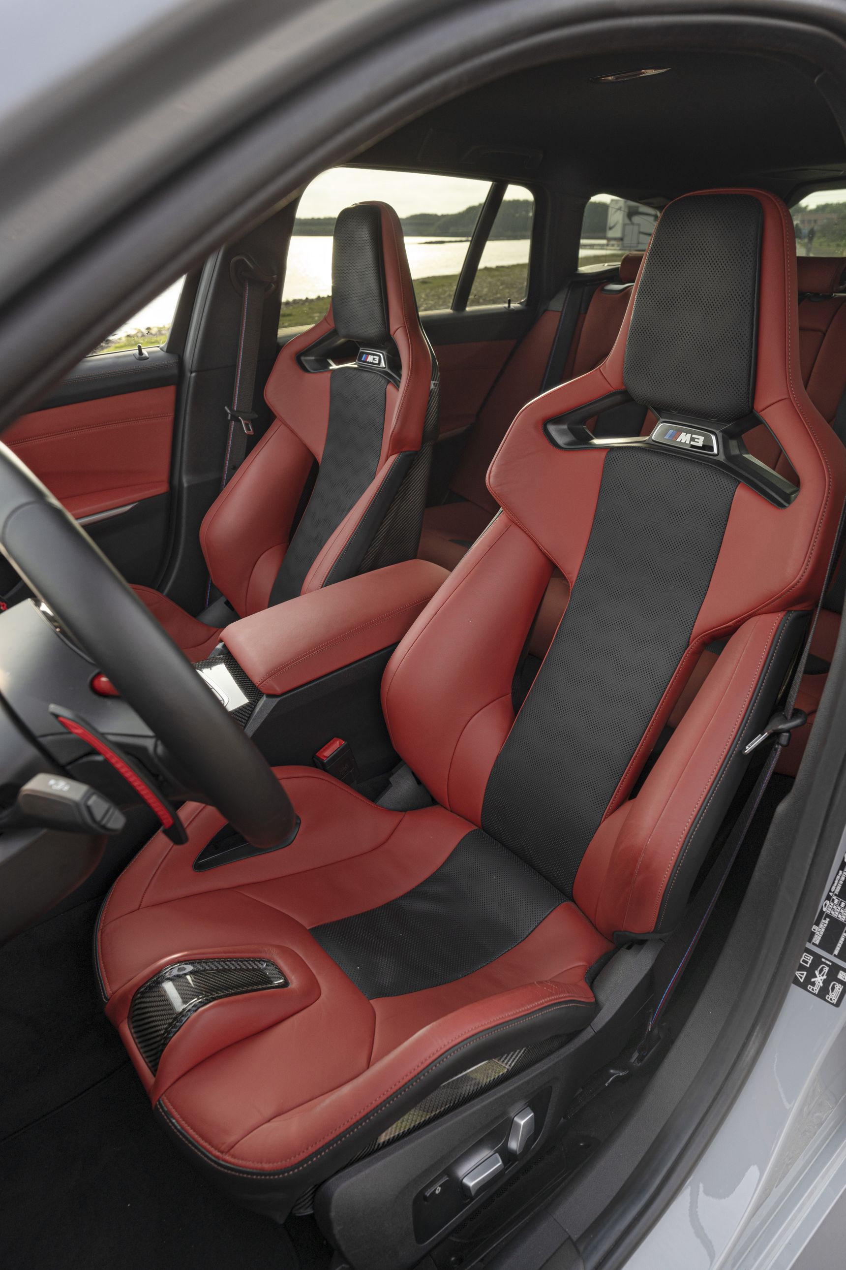 2023 BMW M3 Touring interior red carbon seats