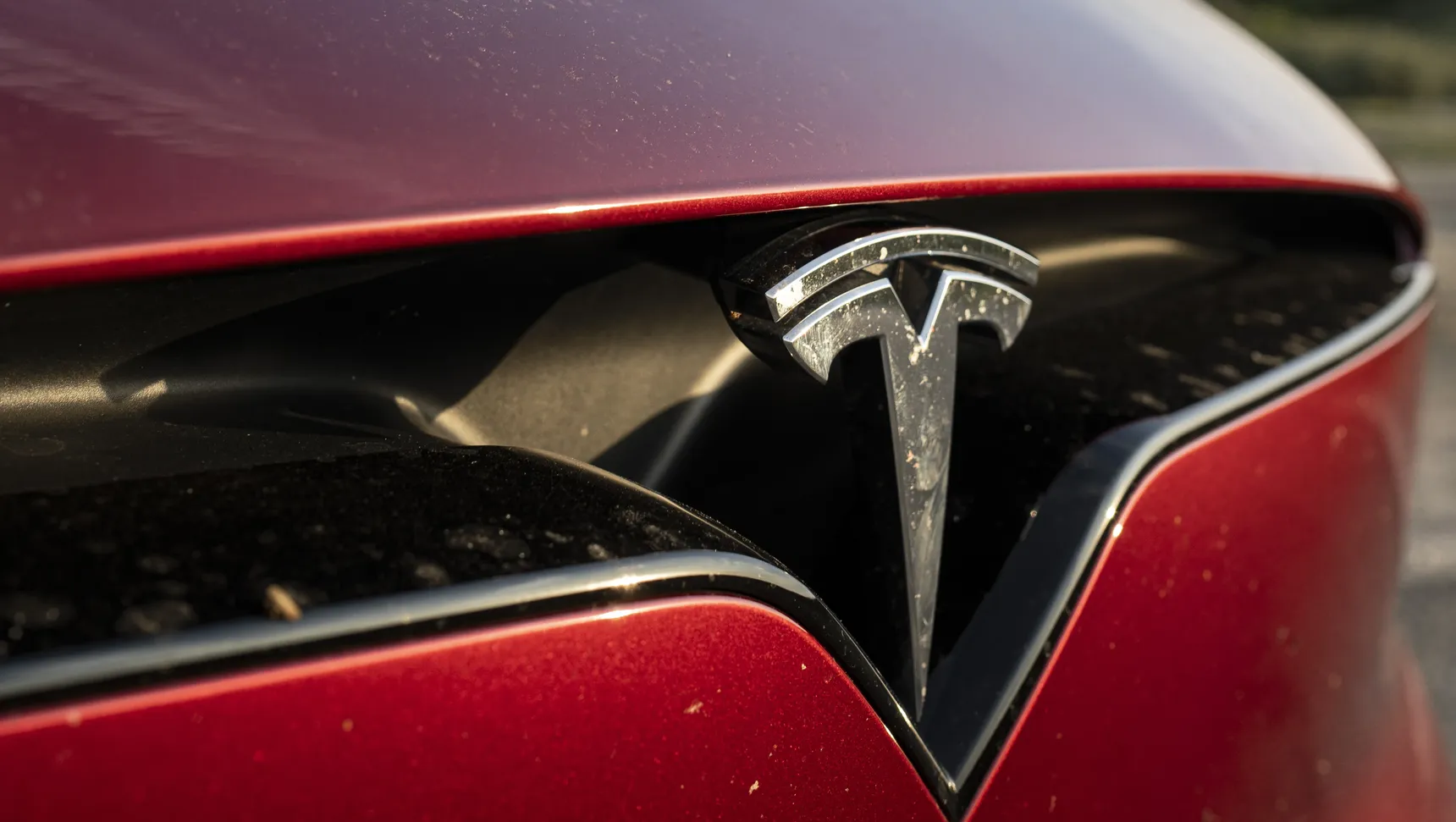 2024 Tesla Model X Long Range Red logo front iphone background