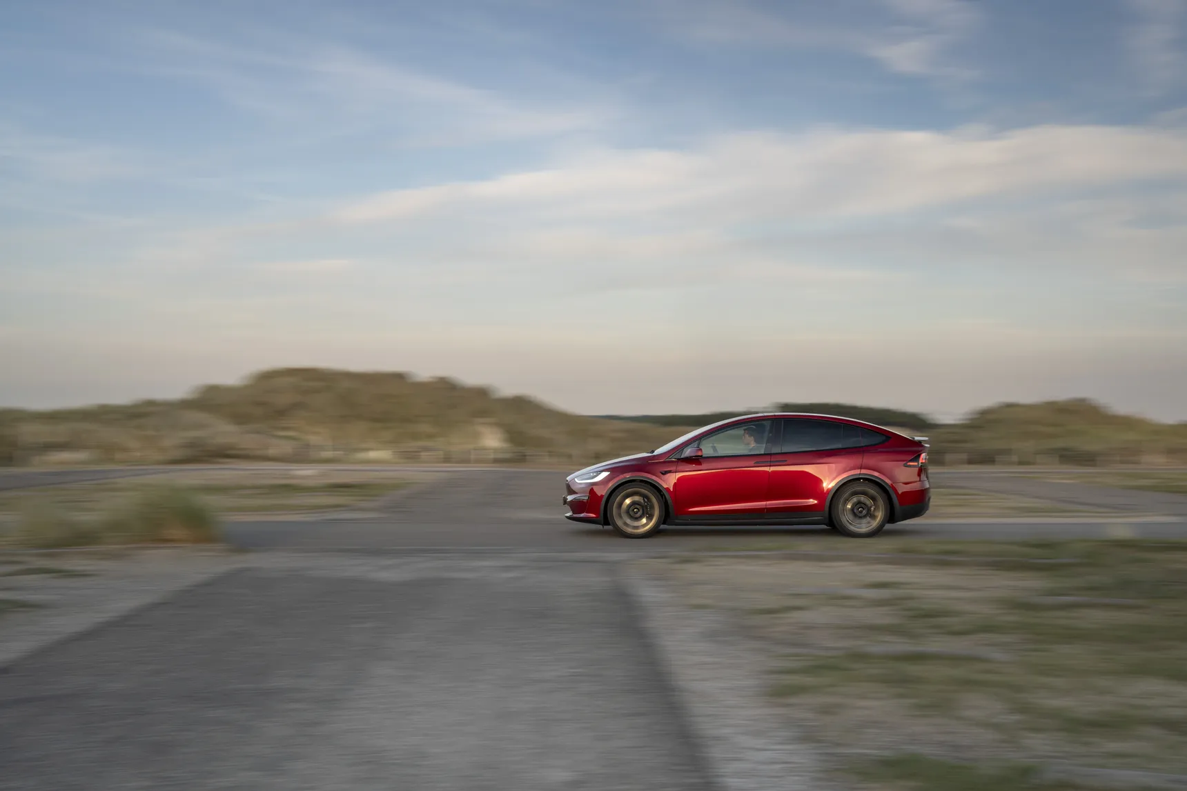 2024 Tesla Model X Long Range Red side profile