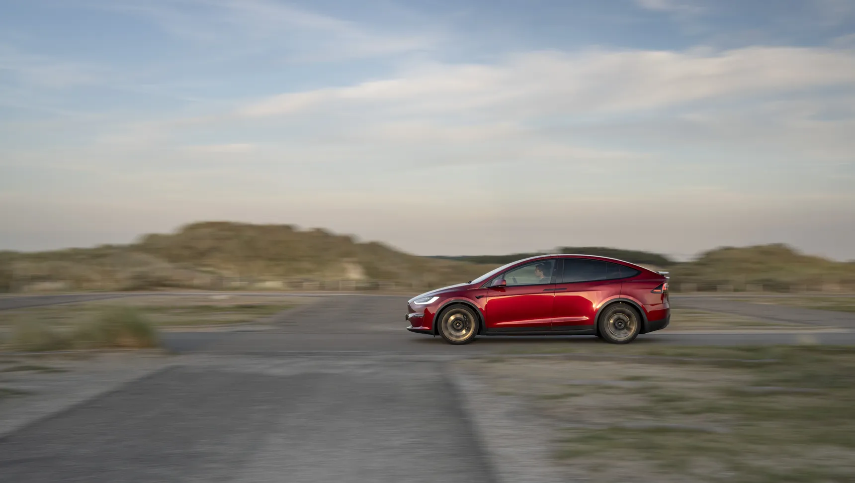 2024 Tesla Model X Long Range Red side profile