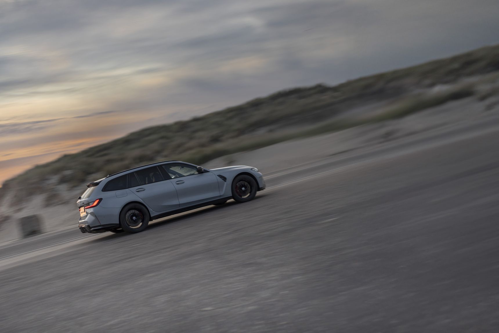 2023 BMW M3 Touring panning rolling side fast