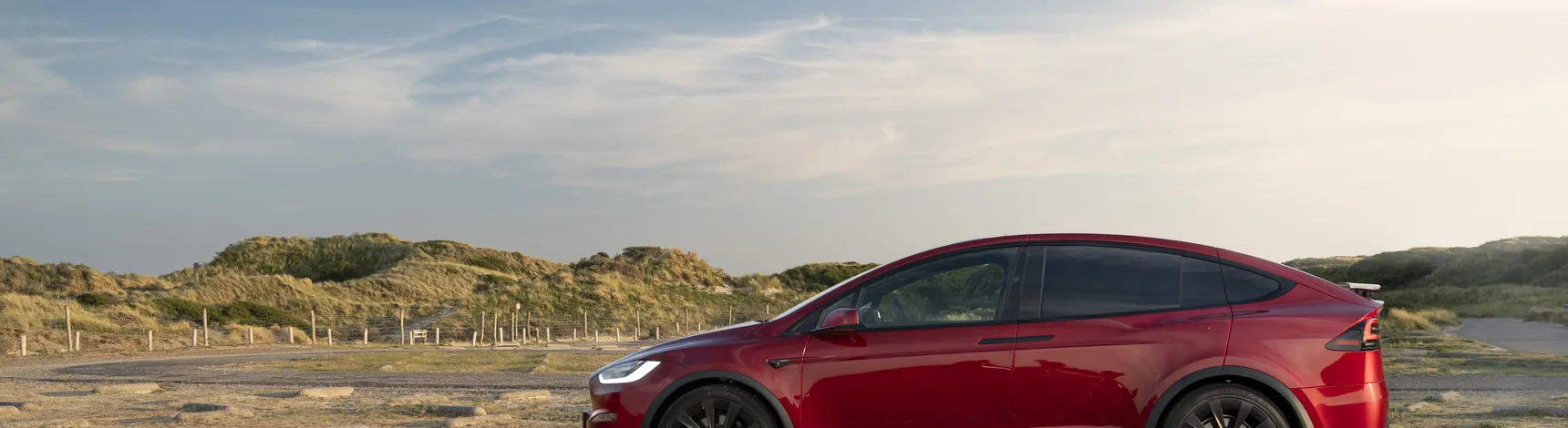2024 Tesla Model X Long Range Red side profile