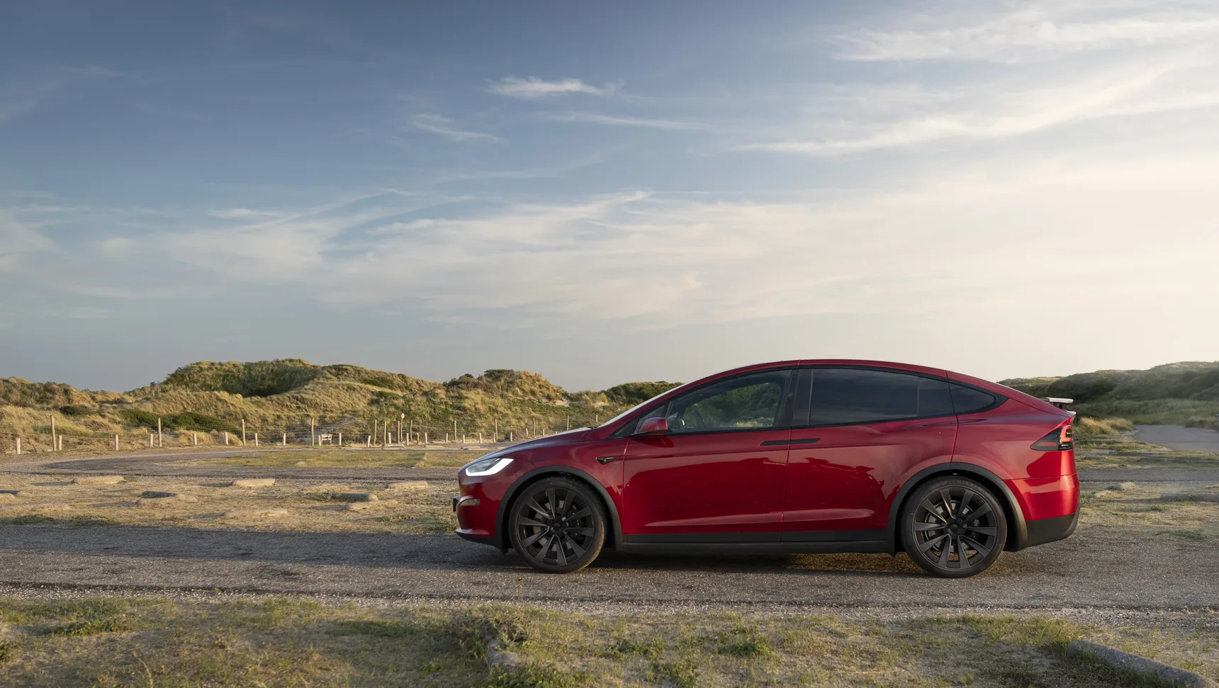 2024 Tesla Model X Long Range Red side profile
