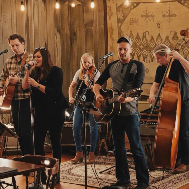 Northern Harvest bluegrass band playing instruments