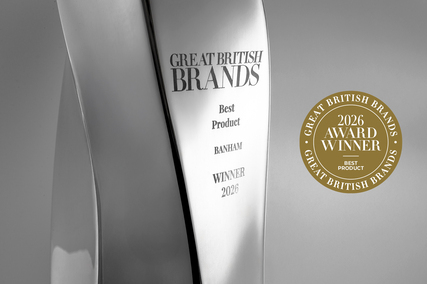 Sleek silver award trophy with "Great British Brands, Banham Locks Best Product, Winner 2026" engraved, next to a gold emblem with similar text.
