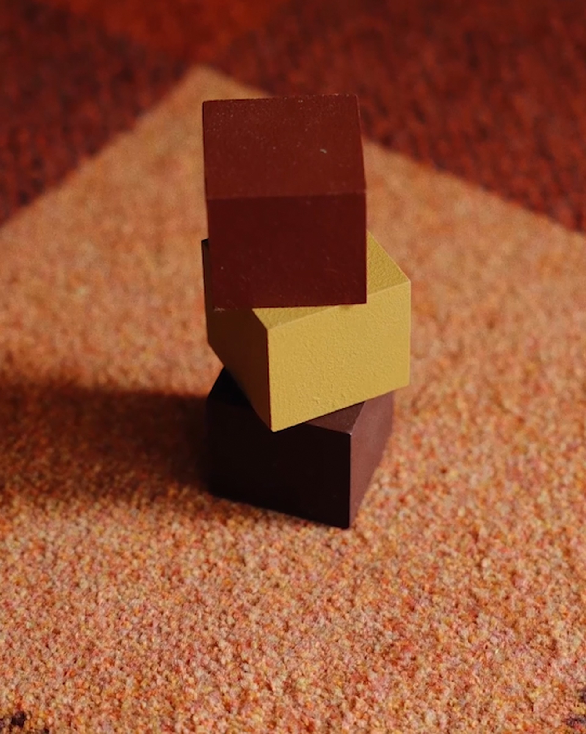 Square painted blocks on top of a doormat