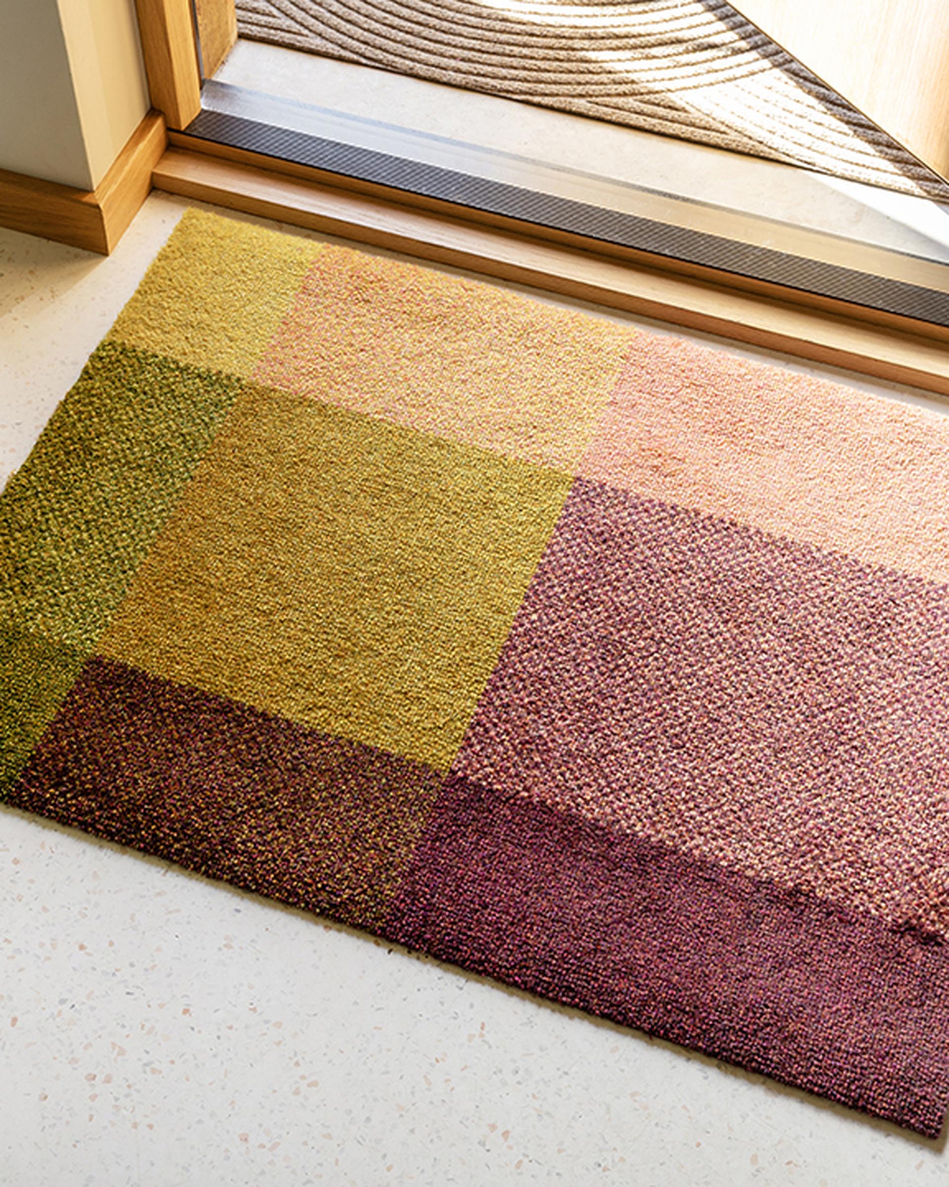Mix Zest doormat close up in a minimalist entryway