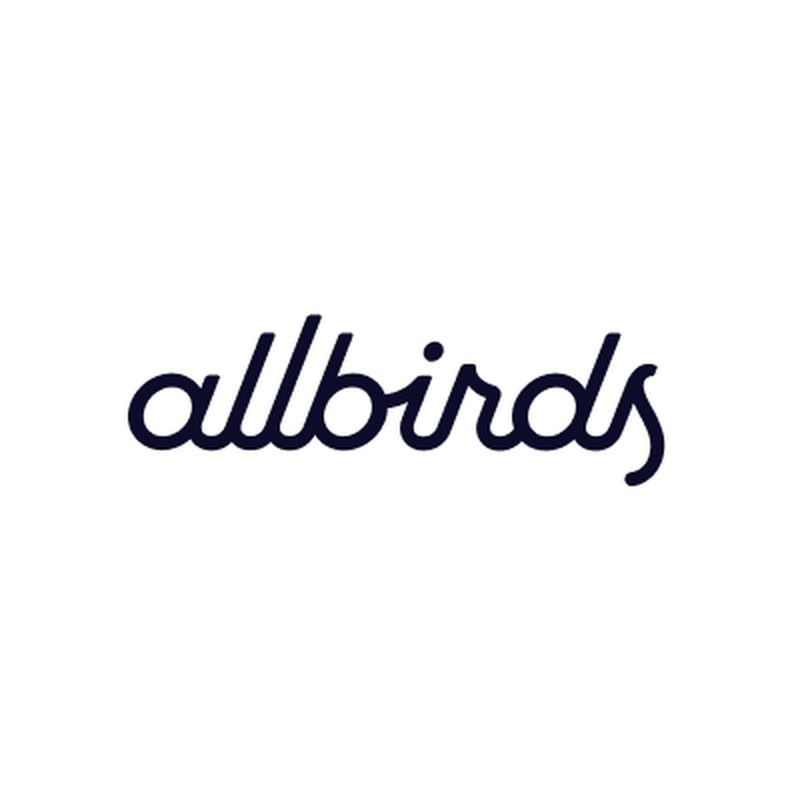 The image shows the Allbirds logo in a cursive, lowercase font against a plain white background.