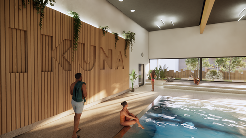 Eintauchen ins IKUNA Erlebnis – moderner Indoor-Pool mit warmen Holzelementen und einladender Atmosphäre für entspannte Stunden im Wasser.