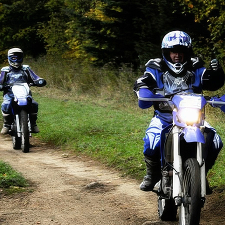 Two motorcyclists in blue and black gear ride along a dirt path surrounded by grass and trees.