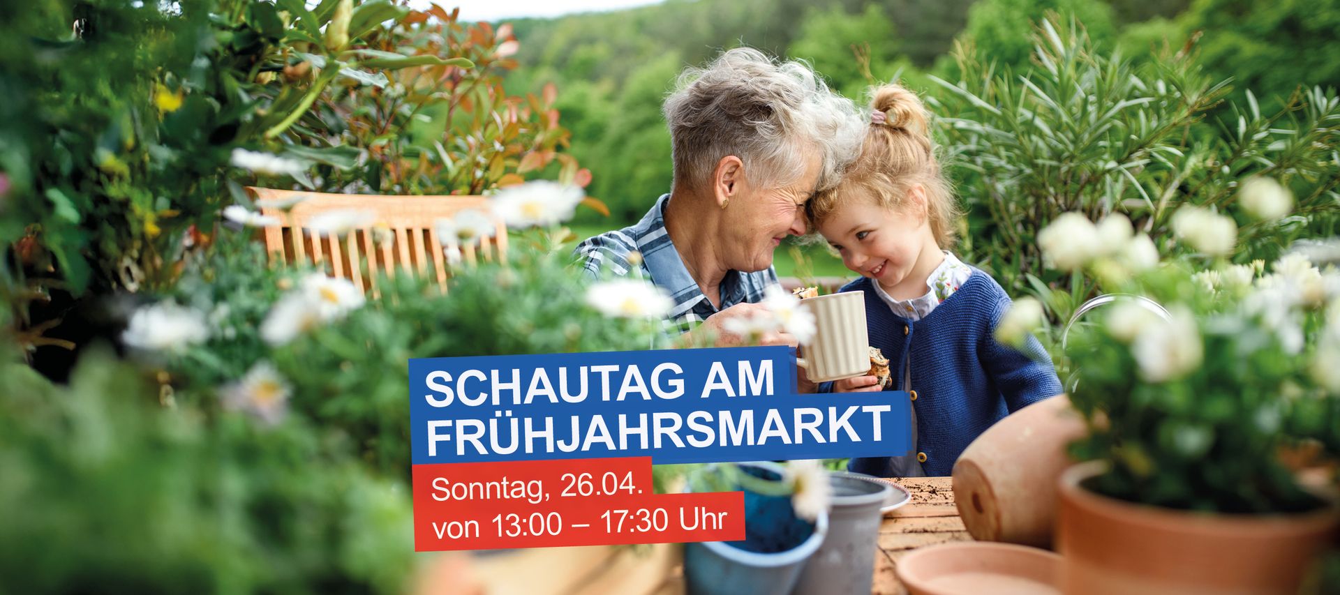 Elderly person and child smiling over a mug in a garden. Text reads: "Schautag am Frühjahrsmarkt, Sonntag, 26.04, von 13:00 – 17:30 Uhr".