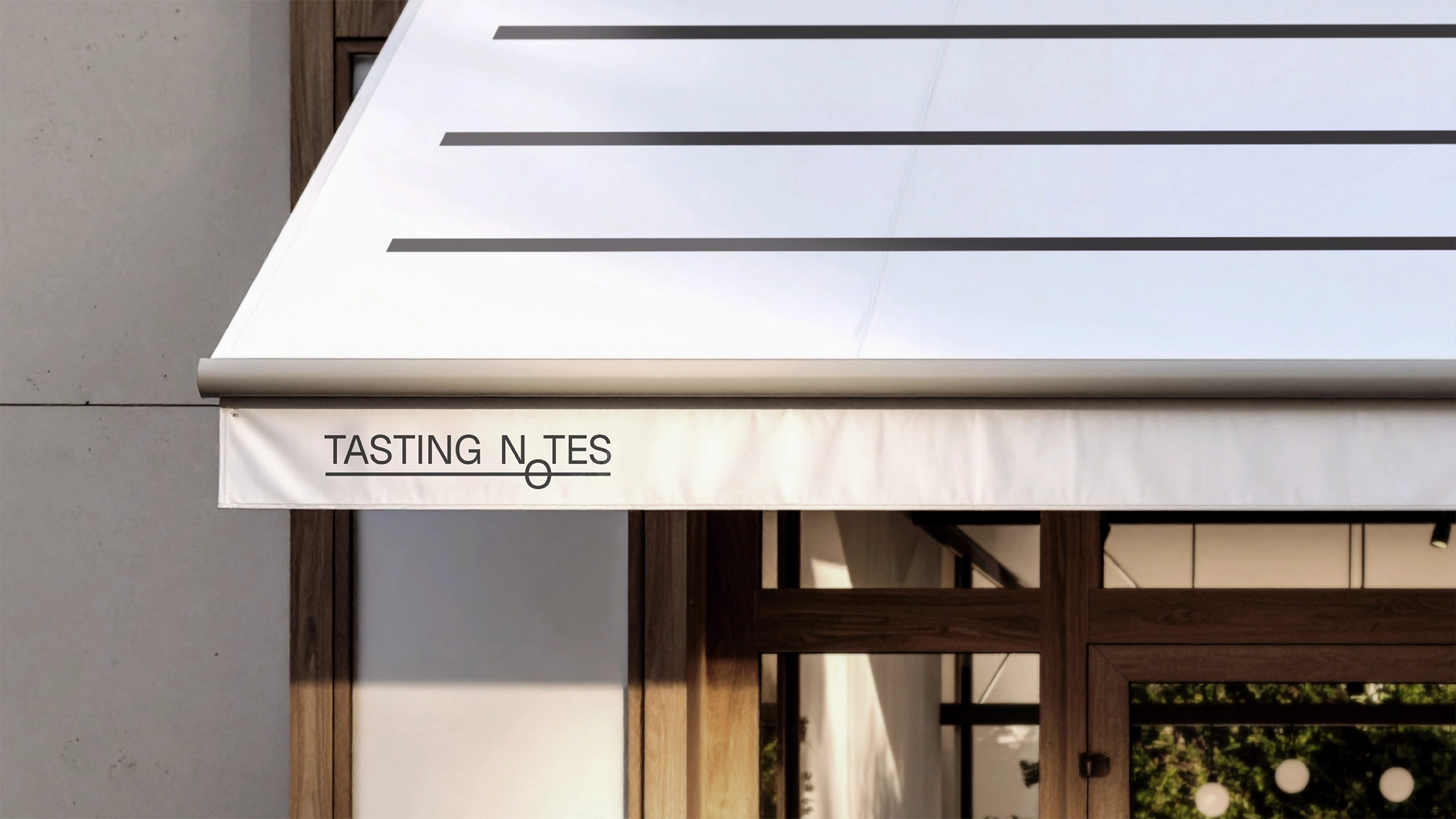 White awning with Tasting Notes coffee and chicken logo over a building entrance