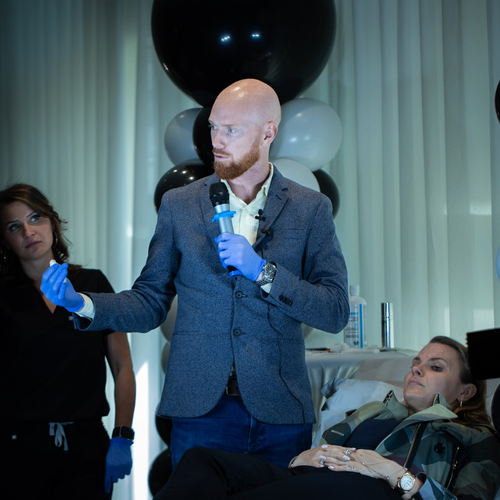 Dr. Dargie presenting a live aesthetics demonstration