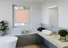 Rosa Plissee im Badezimmer