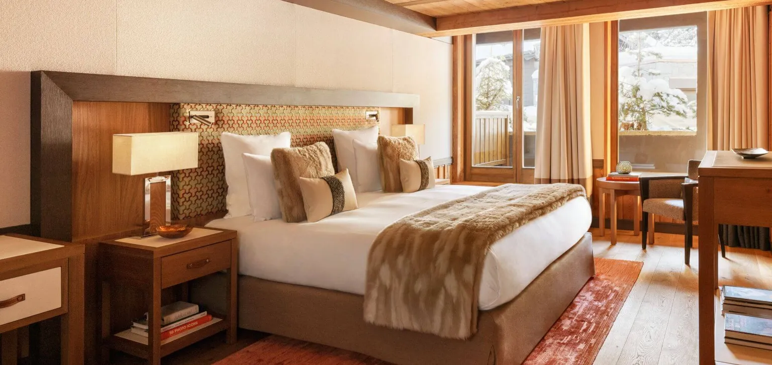 Courchevel Les Neiges chambres Deluxe tapis rouge