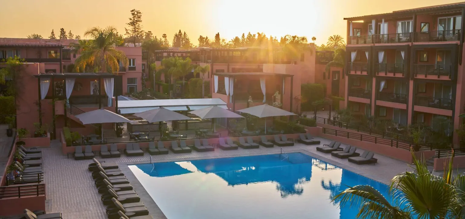 Marrakech Le Naoura Piscine au coucher du soleil