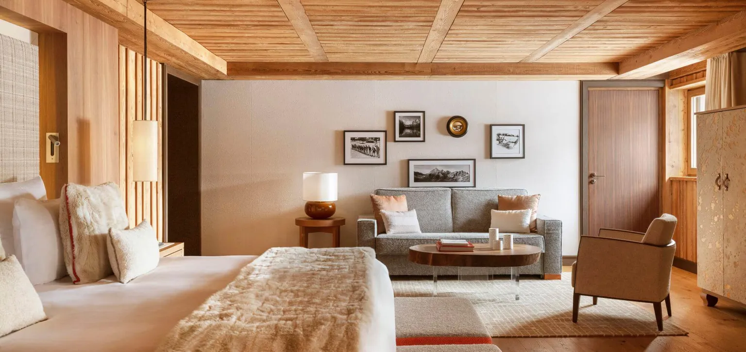 Hôtel Les Neiges à Courchevel, Junior Suite prestige lit et coin salon