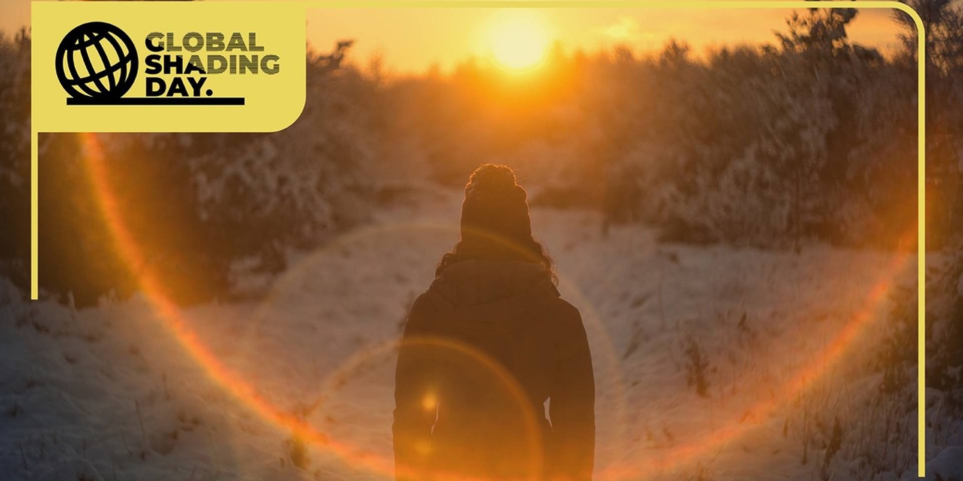 Winter sunset scene with person walking in snow, warm sunlight and Global Shading Day branding highlighting the importance of shading