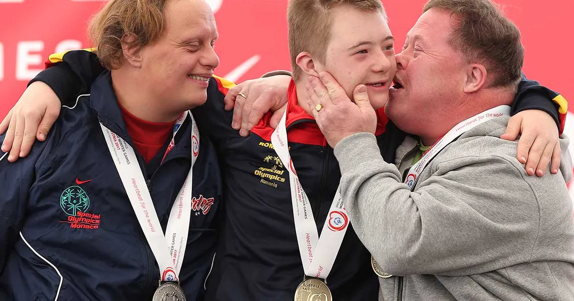 Drei Teilnehmer bei den Special Olympics