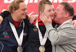 Drei Teilnehmer bei den Special Olympics