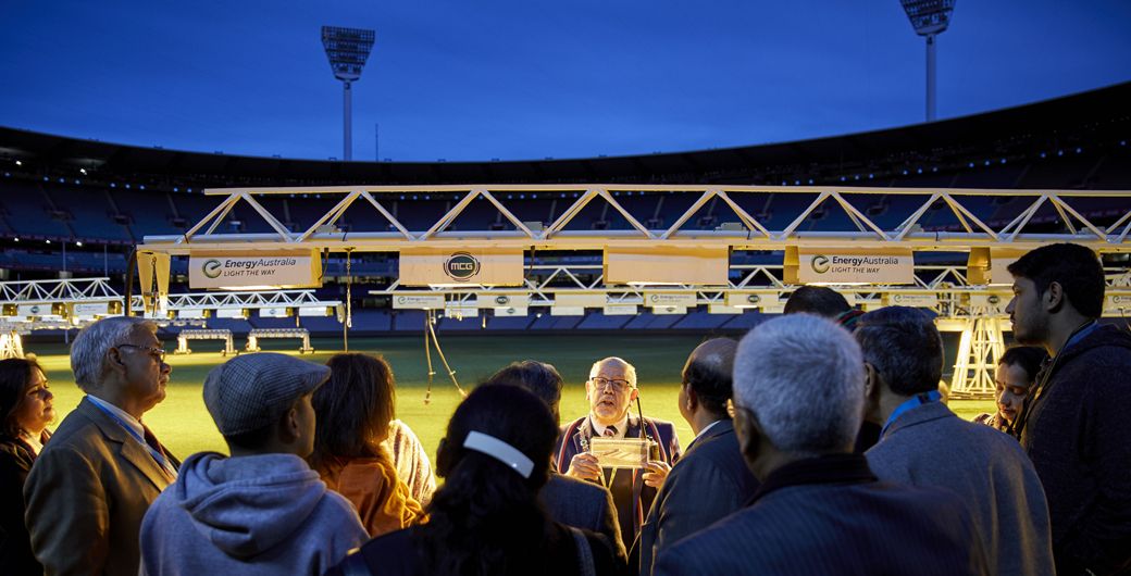 India Advanced Leadership Program participants gathered on the edge of the Melbourne Cricket Ground at dusk for a tour