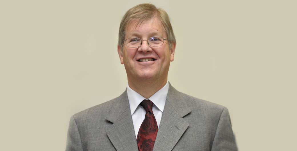 Headshot of Professor John Alford