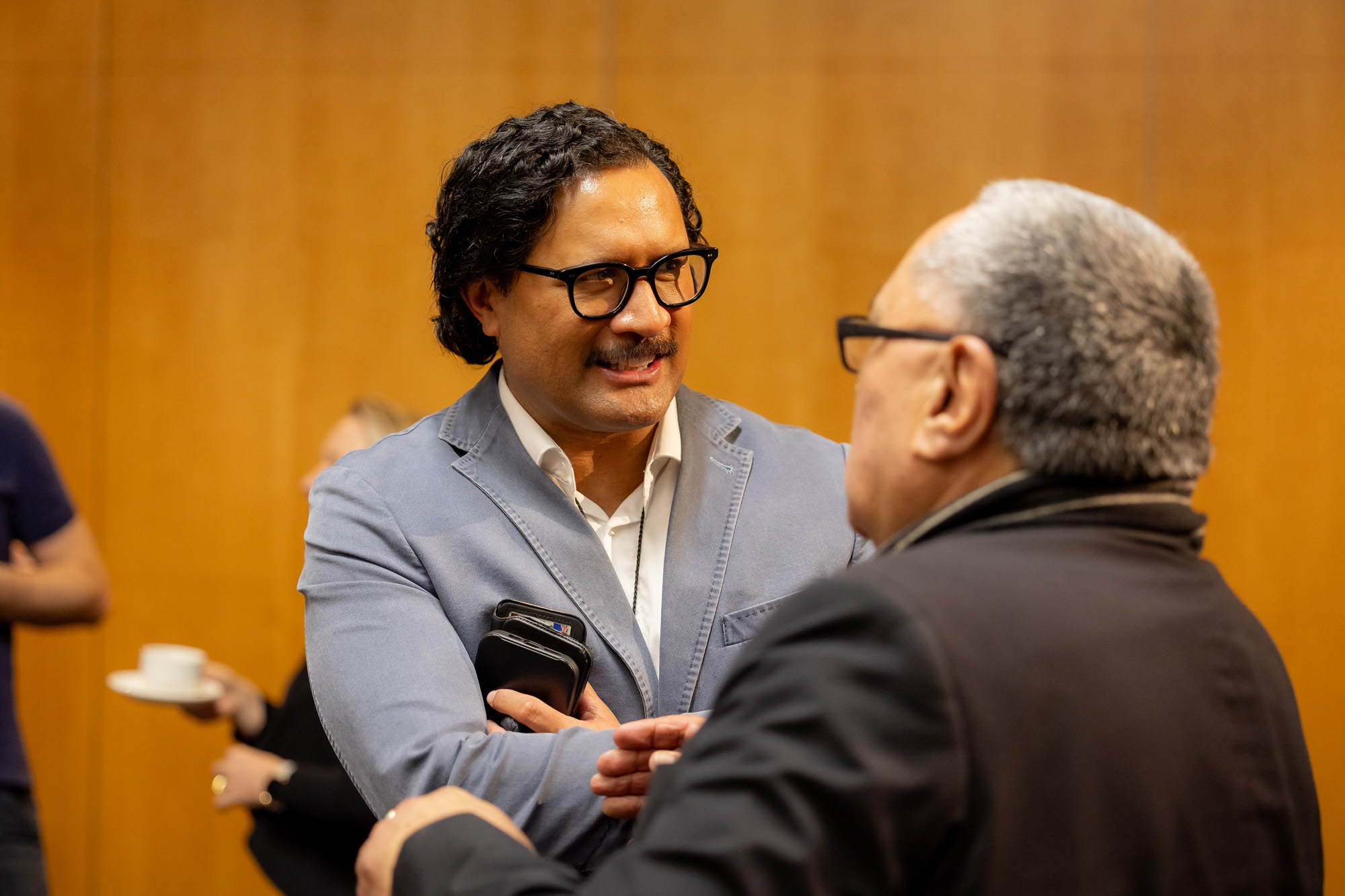Two men in conversation during a break at the Executive Master of Public Administration residential in Wellington