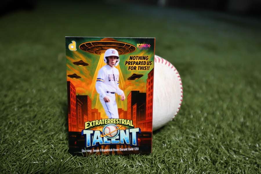 A novelty baseball card featuring a player in a UFO-themed design with aliens and cityscape background.
