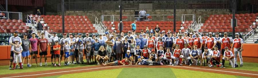 Everyone who played The Tradition, together on the field at night
