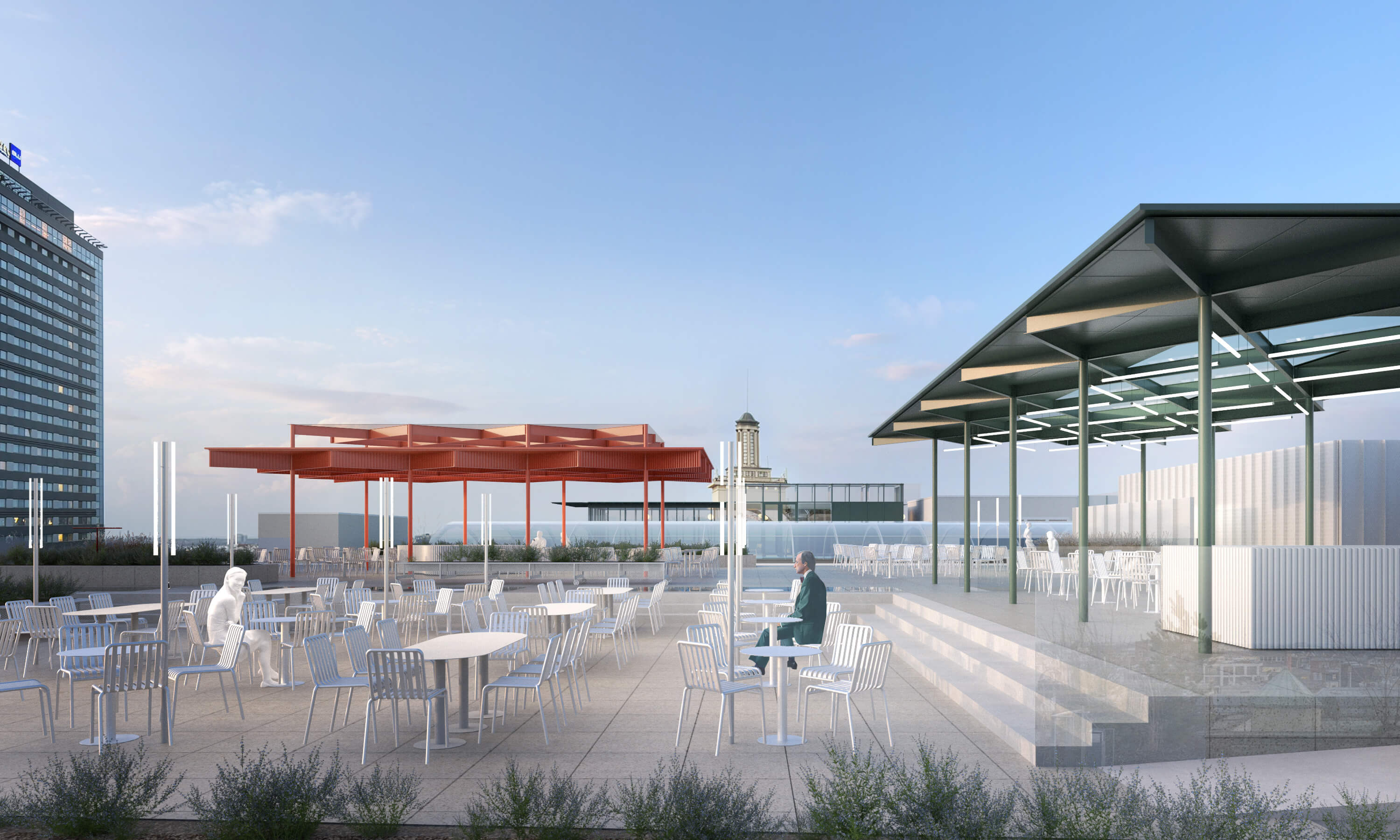 Rooftop terrace with white tables and chairs, featuring red and green shaded structures under a clear blue sky.