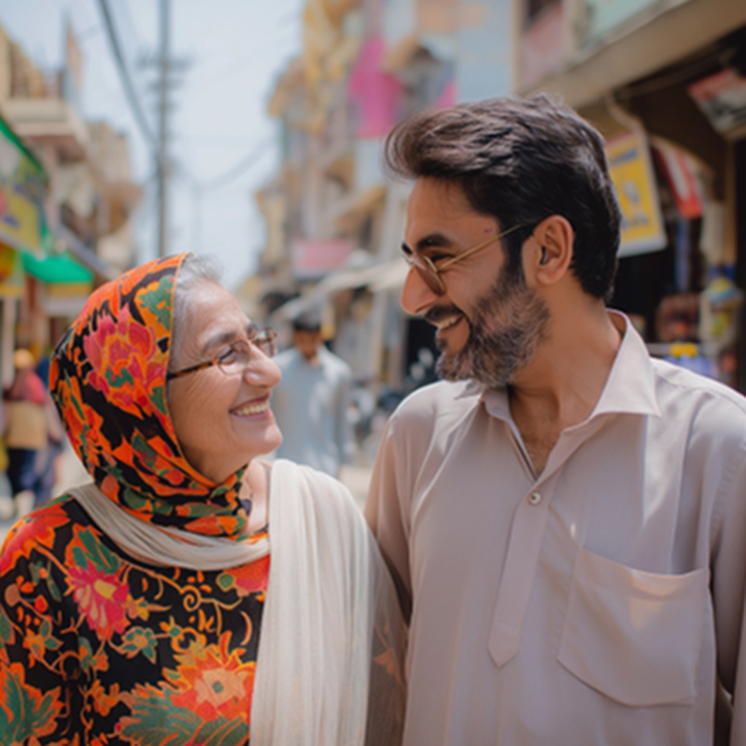 Pakistani mother and son smiling