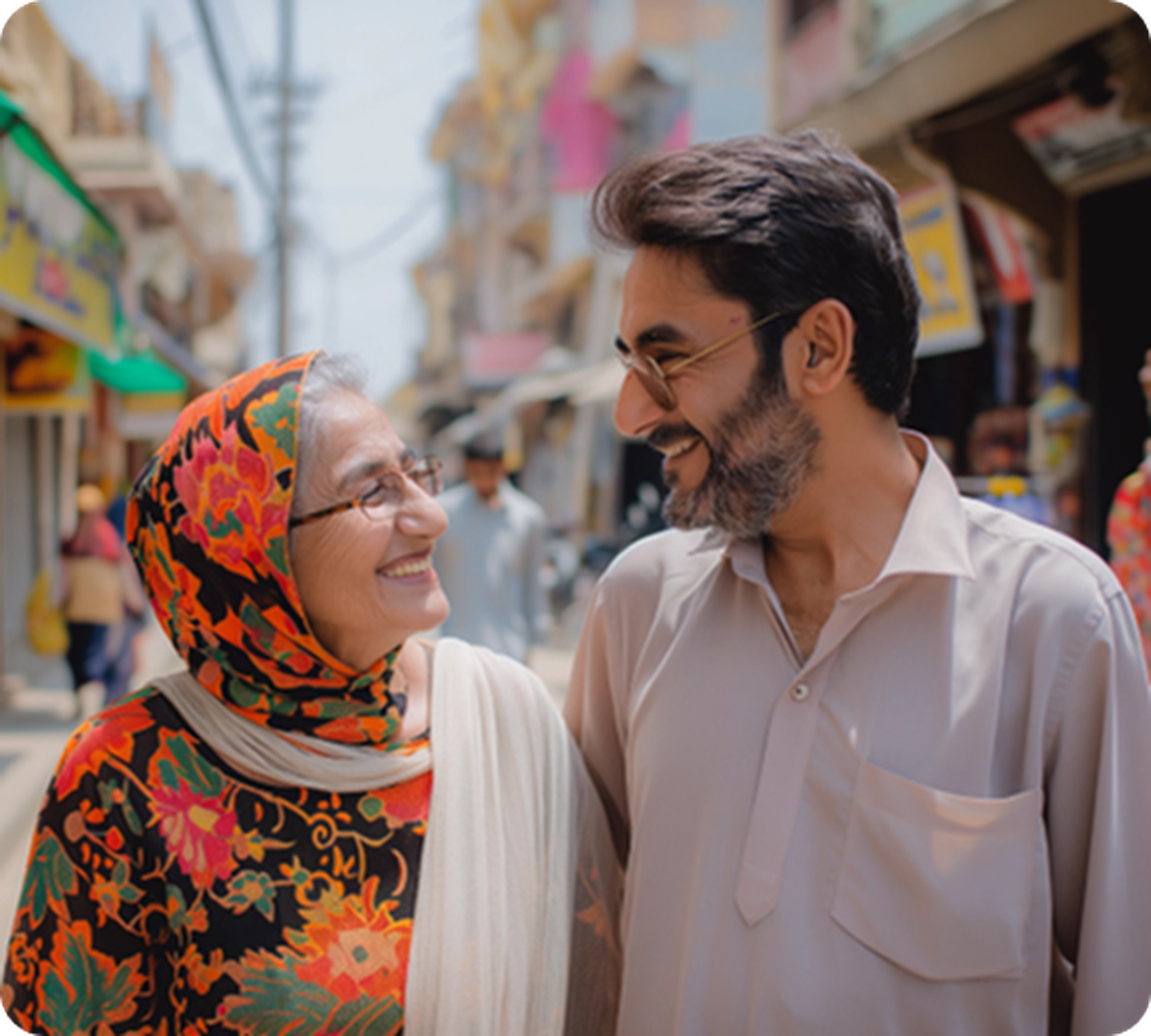 Pakistani mother and son smiling