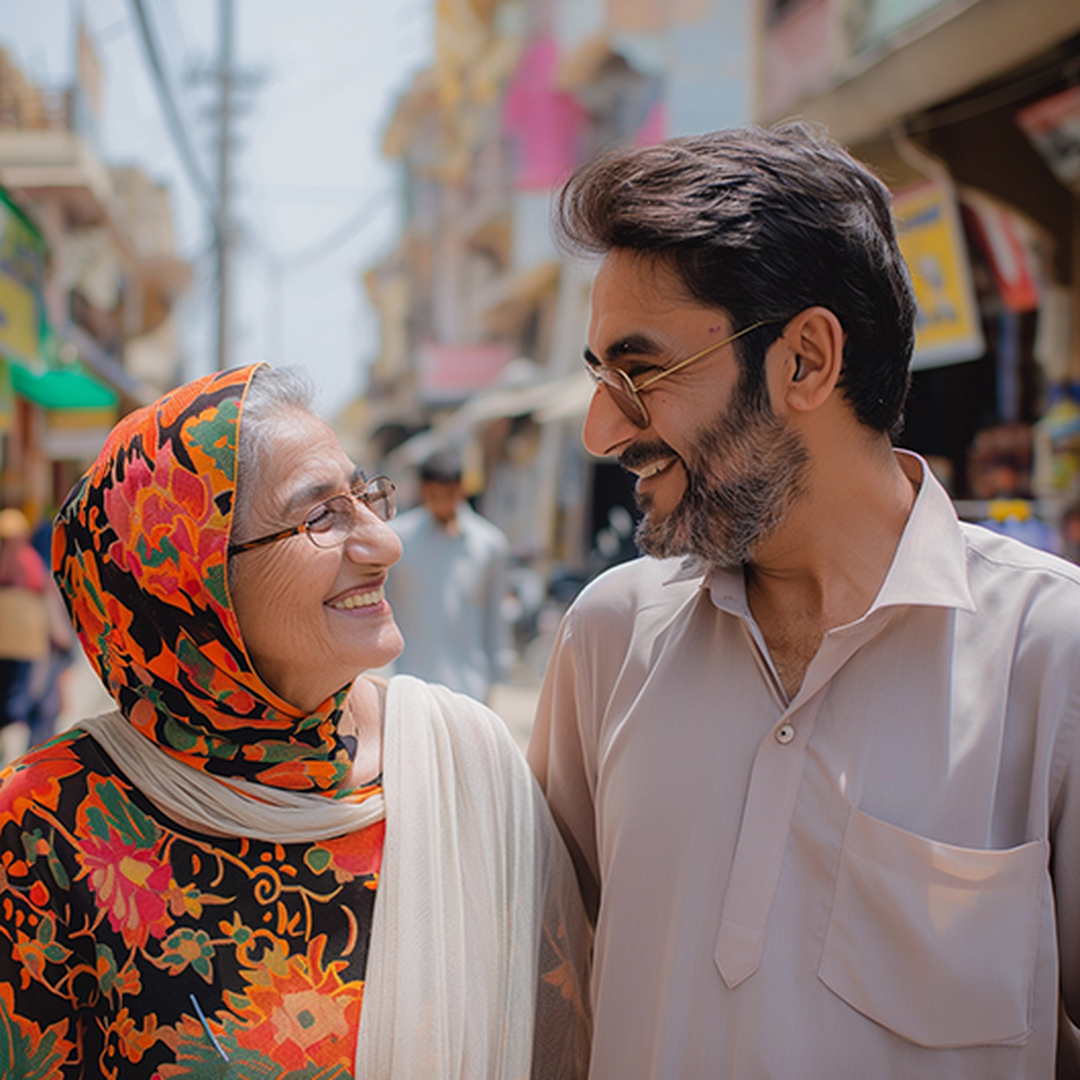 Pakistani mother and son smiling