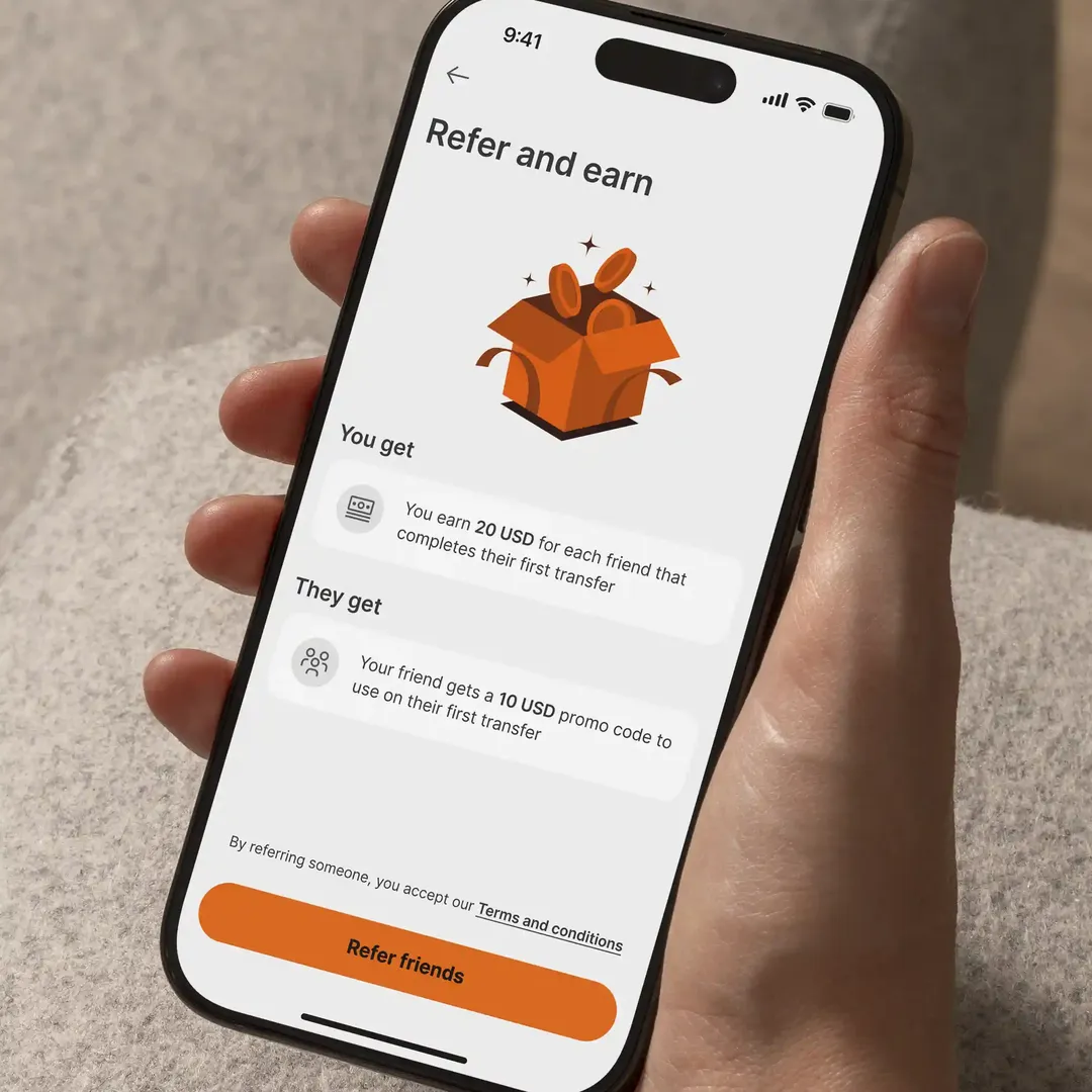 Phone showing a ‘Refer and earn’ screen on the Ria app.