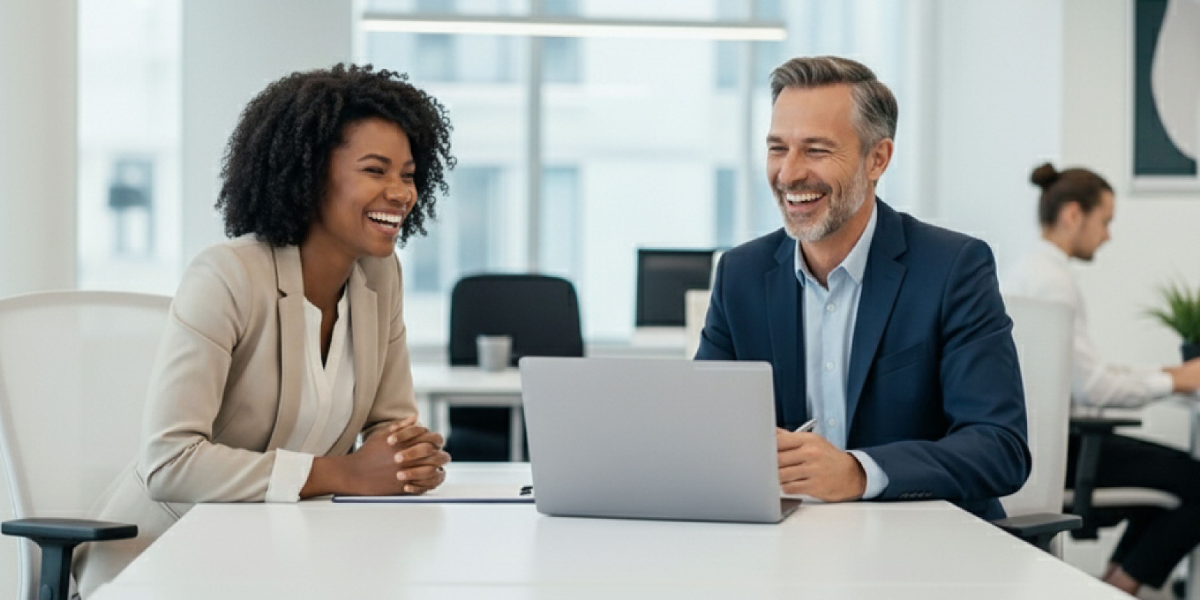 Woman and man collaborating in an office