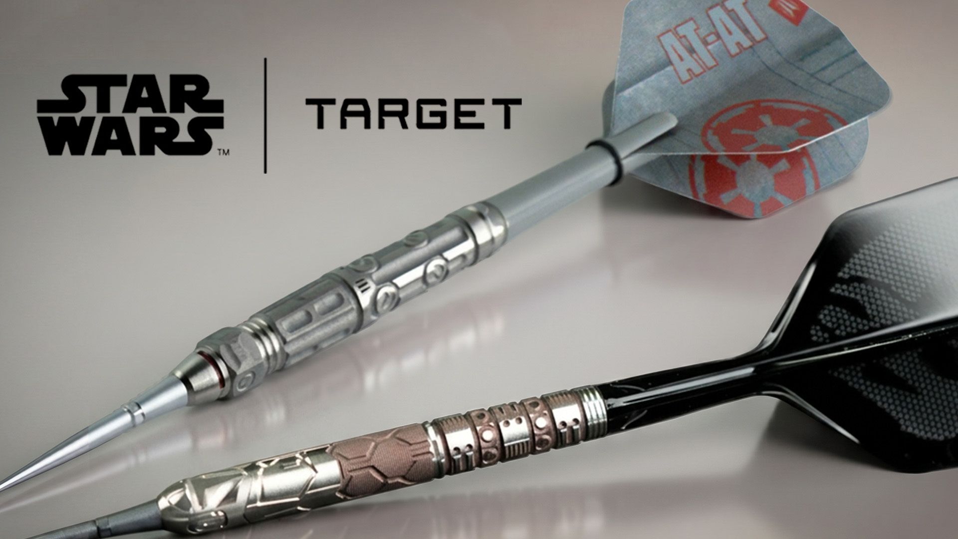 Two Star Wars-themed darts, featuring detailed, metallic designs. Logos for Star Wars and Target are displayed in the background.