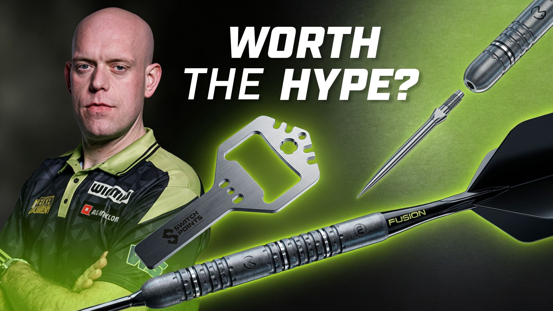 Bald man in a green and black shirt beside a dart tool set against a green background, with text reading "Worth the Hype?"