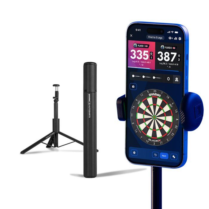 A smartphone displaying a dart scoreboard app is mounted on a stand, alongside a compact, collapsible tripod and cylindrical case.
