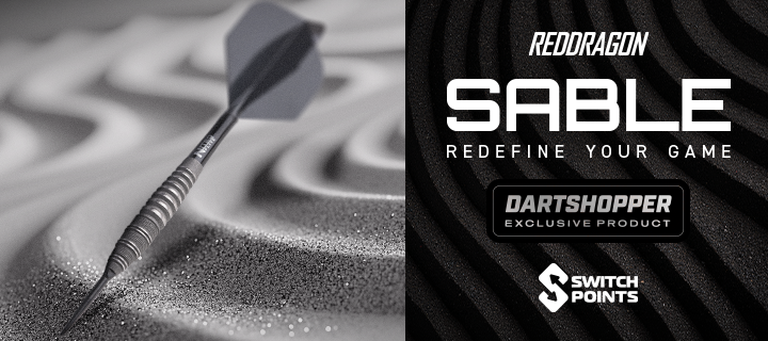 A dart embedded in swirling sand next to text promoting the RedDragon Sable as a Dartshopper exclusive.