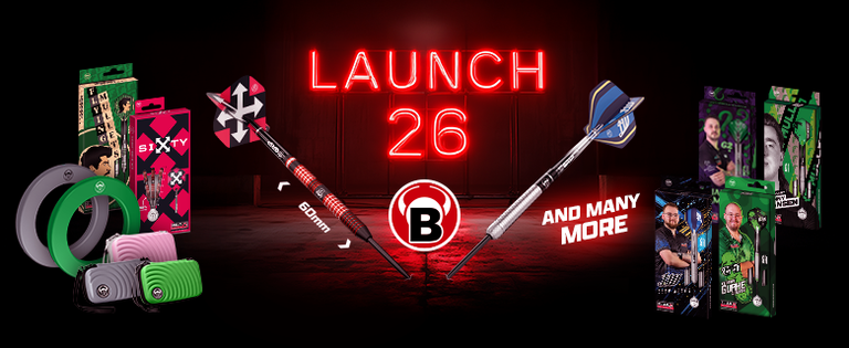 Darts and accessories displayed with a neon "Launch 26" sign in the background and various packaging on either side.