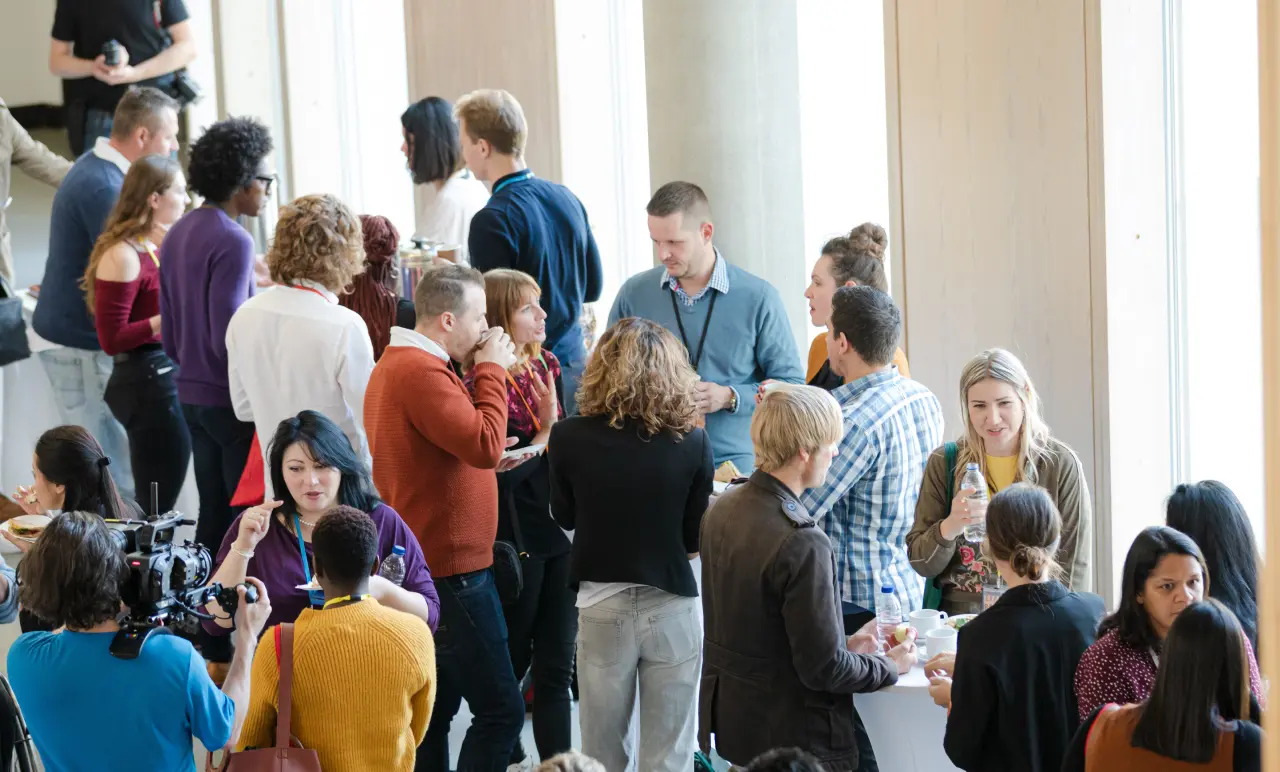 People Standing In A Room Event