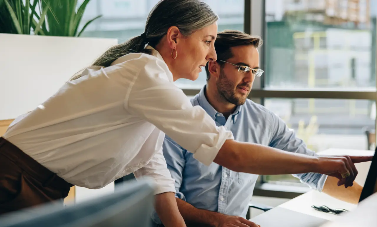 Two People Working Together